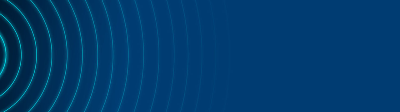 Decortative background of concentric circles on a blue background.